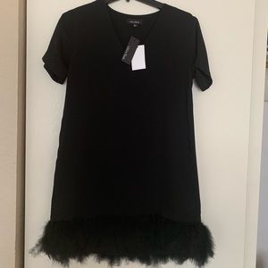 Black mini dress with real feathers